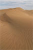 Lijnen gevormd door de wind in de duinen van Maspalomas op Gran Canaria