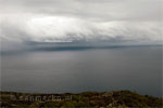 Uitzicht vanaf La Palma op de regenwolken boven de Atlantische Oceaan