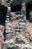 De erosie tussen de harde grijze lavastromen tijdens de wandeling naar Lomo de Tablado en Roque de La Cabezaca