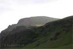 Uitzicht op Reynisfjall in een heerlijk zonnetje in IJsland