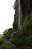 Tijdens de wandeling aangekomen bij de waterval bij Bica da Cana