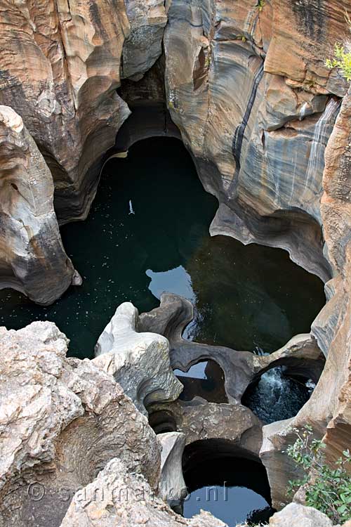 Een typische Pothole bij Bourke's Luck Potholes